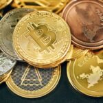 Cryptocurrency Types - a pile of gold and silver bitcoins