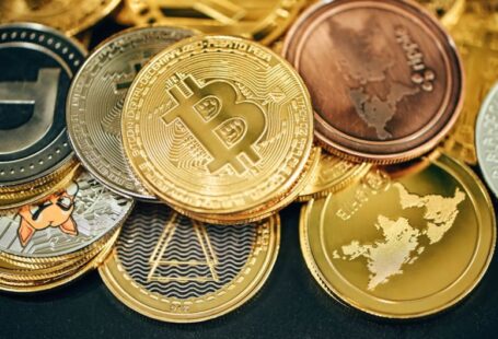 Cryptocurrency Types - a pile of gold and silver bitcoins