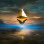 Crypto - yellow and black triangular structure under cloudy sky during sunset