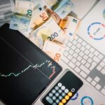 stock-charts-on-tablet-screen-business-and-economy